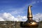 Old copper still at the entrance of the Ardbeg whisky distillery on the isle of Islay