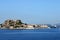 Old Corfu fortress and cruiser ship