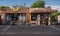 An old corner gas station converted to a restaurant Tucson, Arizona, features old gasoline pumps