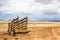 An old corral, abandoned in the desert of Arizona under a blue sky with bright white