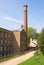 Old cotton mill by path