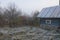 old country sauna in the garden in November in the first frost