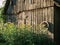 old countryside barn from wooden planks and concrete in rural area