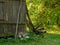 old countryside barn from wooden planks and concrete in rural area