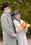 Old couple in autumnal park