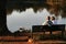 Old couple feeding ducks