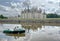 Old couple grandmother and grandfather travel together by boat in Loire, France