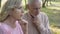 Old couple thinking over age-related health problems, low social protection