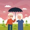 old couple using umbrella
