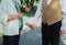 Old couple is walking in the green park. Grandmother and grandfather at their golden wedding anniversary celebration. Fifty years