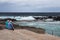 Old couple watching the ocean, Mesa del Mar, Tenerife, Canary Islands, Spain