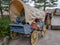 An old Covered wagon and instrument, tool, device, gadget, machine, appliance