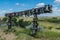 Old cowboy boots hanging on a post in Great Sandhills in Saskatchewan, Canada