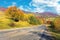 Old cracked country road in autumn