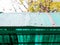 Old cracked green polycarbonate panel on roof
