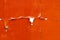 Old cracked orange paint background texture wall
