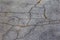 Old and cracked road surfaces are used to create the background and design. Deep relief Cracks on the pavement. Worn road, very