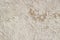 Old cracked weathered shabby beige painted plastered peeled wall background