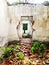 Old crumbling brick house in ruins