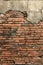 Old crumbling brick wall vertical background