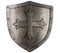 Old crusader metal shield with cross isolated
