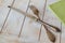 Old cutlery on wooden shabby table, aged silver knife and fork