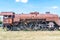 Old Czechoslovakian CSD steam engine on graveyard, rusty