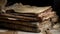 Old, damaged books or history scrolls written in the Middle Ages or earlier.