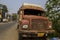 A old damaged truck standing road side with selective focus