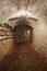 Old, dark basement corridor in ancient house