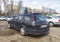 Old dark blue car Toyota Corolla hatchback medium left side and rear compartment view