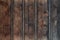 Old dark brown wooden dirty planks texture