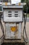 Old decayed rusting petrol gas pump with Shell Petrolium branding and signs