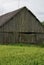 Old decaying shed from the boards of yesteryear.Old rickety wooden winches.