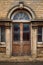 Old decaying wooden double doors