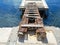 Old decking on the docks in the Sicilian port. Italy