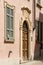 Old decorated portal at Orta san Giulio, Italy