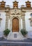 An old decorated vintage door in historical centre of Rome, Italy