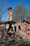 An old demolished little house in the middle of the forest. Household ruins in Central Europe