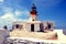 Old deserted lighthouse on greek island mykonos