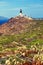 Old deserted lighthouse on greek island mykonos