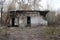 Old destroyed building with broken broken broken glass in the Windows non-residential premises house with dangerous debris falls