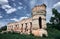 Old dilapidated castle on a background of blue sky