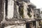 Old and dilapidated rows of tombs at a public cemetery