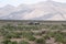 Old dilapidated trailer house in the desert