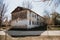 Old dilapidated, weather-beaten house that needs to be renovated. Housing problem