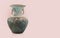 Old and dirty brown and blue earthenware vase with ears on pink background, object, decor, vintage, copy space