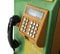 Old and dirty coin telephone with clipping path