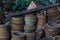 Old dirty flower pots stacked in garden