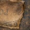 Old dirty hessian sack bag stamped used as upholstery material